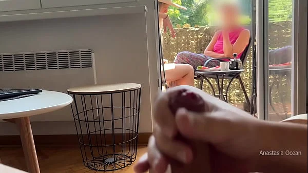 My husband is jerking off and cum in front of my stepmom a while we talk on balcony.