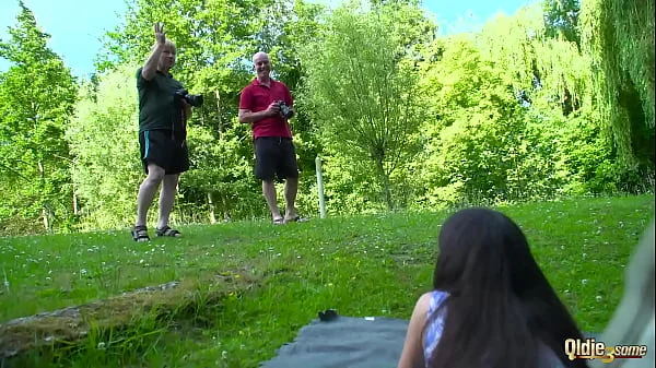 Hot brunette takes cum in mouth from 2 old guys in the same time