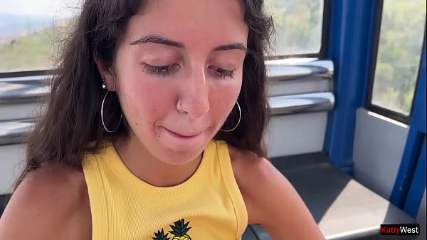 Beauty sucks cock on a Ferris wheel in an amusement park