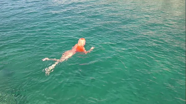 Blue water and a naked girl!