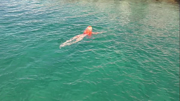 Blue water and a naked girl!