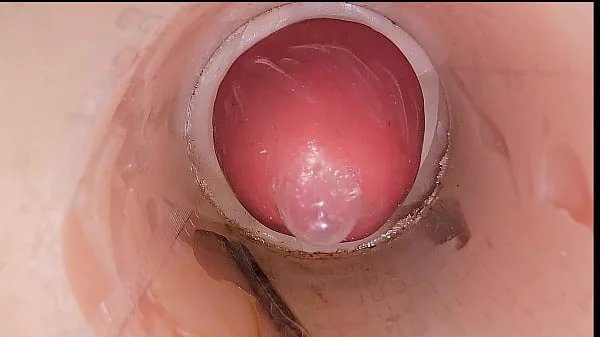 The camera in the deep pussy records a huge ejaculation of sperm into the condom