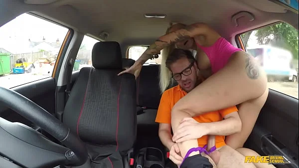 Fake Driving School Big Breasted Blonde MILF with lots of Tattoos likes it ROUGH