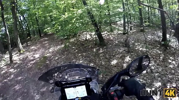 HUNT4K. Humiliating her boyfriend while sucking a huge biker’s cock in the forest