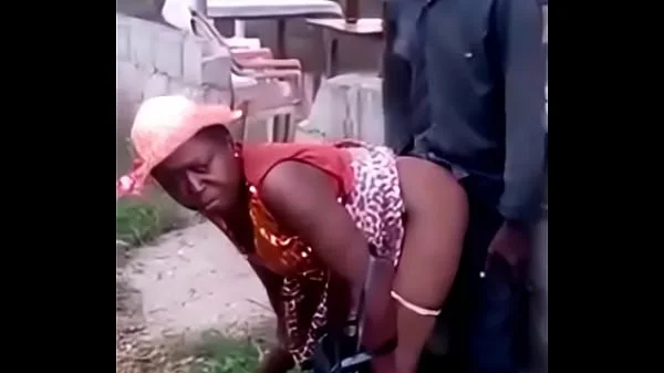 African woman fucks her man in public