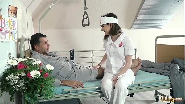 Teen nurses fuck old grandpa in a fake hospital bed and give sloppy blowjob