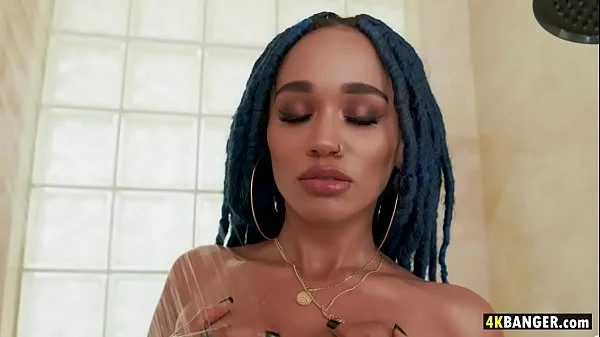 Bubble butt rasta babe fucks in the shower