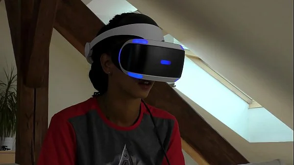 Isabel flashes her pussy and ass under her panties with a tshirt and she has a new game in her Playstation VR but she needs..