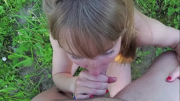 Outdoor. Public blowjob. Russian Slut in a micro-bikini sucks dick in the park