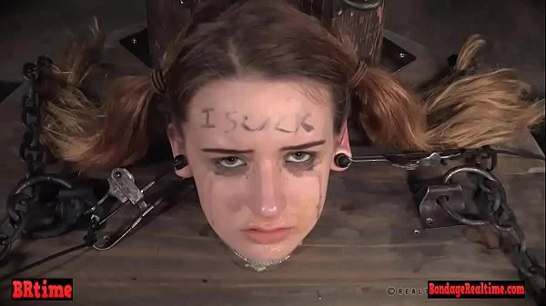 Bdsm babe trapped in a barrel and electrified