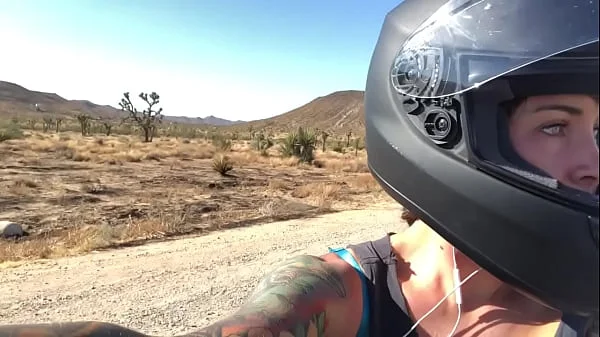 felicity feline riding on aprilia tuono motorcycle