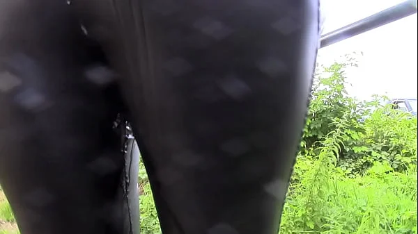 Peeing in leather jeans