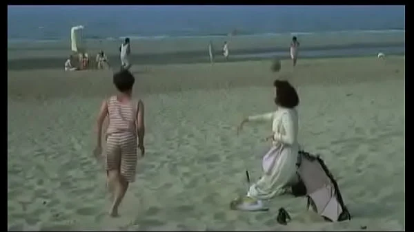 Woman robbed on the beach by stealing all her clothes. Robbed naked. ENF.