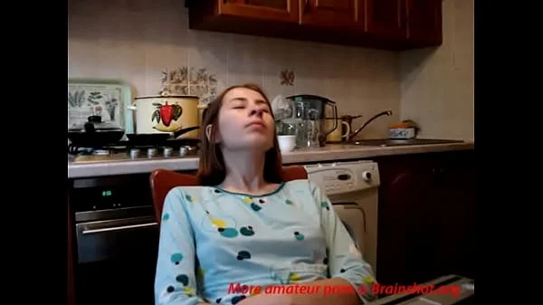 Teenie fingers to orgasm in kitchen