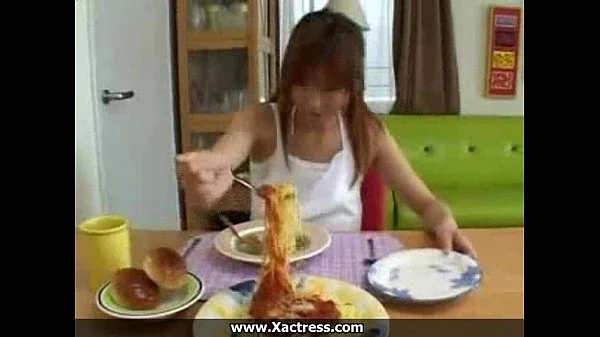 Funny asian couple at home