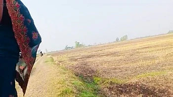 Desi Bhabhi RadhaDevi Pissing in Field Outdoor Hindi Webcam Masturbation