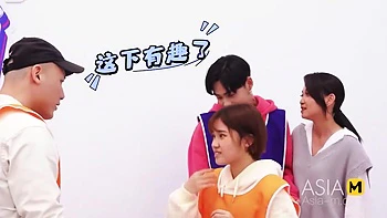 An Asian Group Plays An Undressing Game