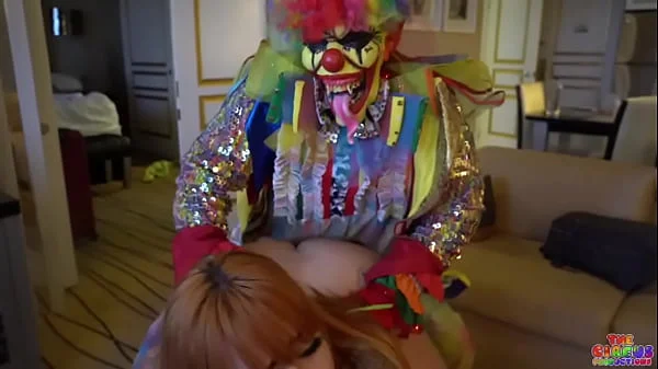 Busty Redhead Milf gets her pussy destroyed by clown