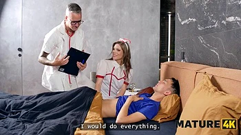 MATURE4K. Sexy Czech nurse is having sex with her patient right in front of the doctor: Porn