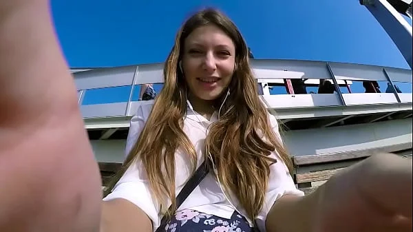 Talia Mint plays in public with remote control toy over the phone with fan