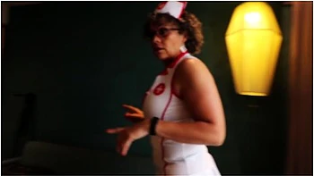 Nurse Comes To See Patient In His Room