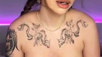 The long-haired nymph in a cat costume provides a deep throat with a yam-sized