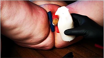 Labia And Clit With Candle, Clips And Brush