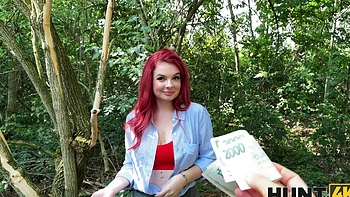 A pale girl with red hair is fucking with her instructor outdoors