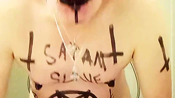 Satan slave poses his own shit feet