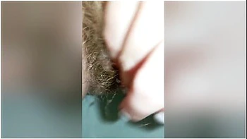 Bushy Pussy Girl Peeing In The Toilet With A Sanitary Pad In Her Panties