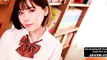 Beautiful Asian Teen At The Library