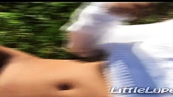 Lupe goes solo outdoors on the grass