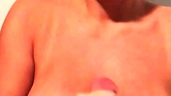 Busty brunette babe tease you with her big boobs