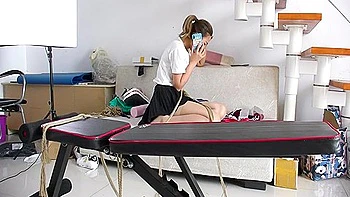 Slender Asian Girl With Sexy Legs Is Introduced To Bondage