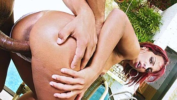 An awesome redhead Grazy Moreno nailed anally by the poolside