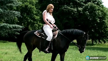 Busty brunette Melissa Mandlikova is having fun with her lovely horse