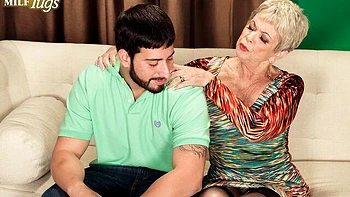 Short-haired mature Lin Boyde knows how to suck a big young cock