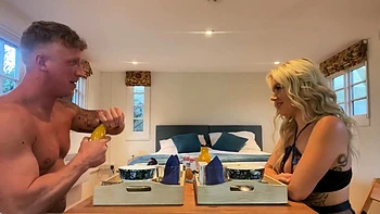 A blonde woman named Lana Rose shows her bald pussy in pink lingerie