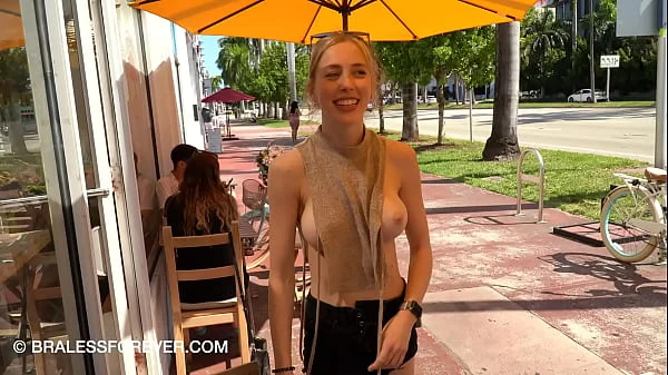 Shan enjoys a coffee with her boobs exposed