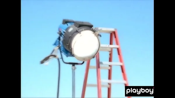 Big boobed blondie Kimberly Holland taking off her sexy uniform outdoor