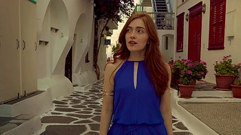 A couple enjoys passionate sex with a stunning redhead, showcasing Jia Lissa’s fiery charm.