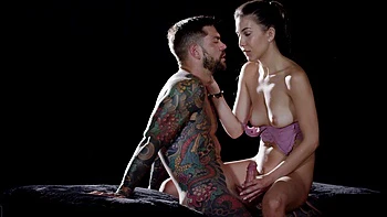 Two cute girls are having fun with a guy in a steamy scene.