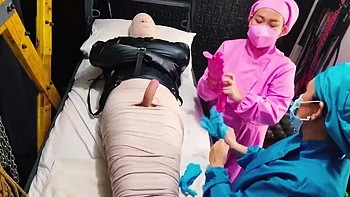 Nurse DominaFireOfficial Mummifies Patient & Fingers His Cock Sounding For Cum - Medical BDSM Bondage