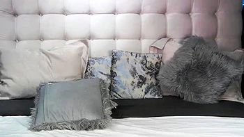 Busty curly brunette with big boobs fucks on couch