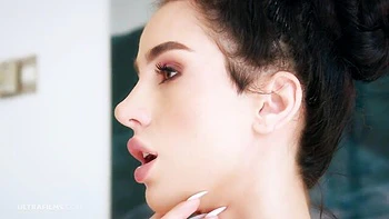 Bitchy brunette Kama Oxi stimulates her shaved pussy with love