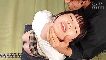 She is hung up and her breasts are fondled and penetrated.