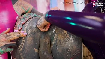 Tattooed blonde sissy Lily Lu takes double fisting anal stretching