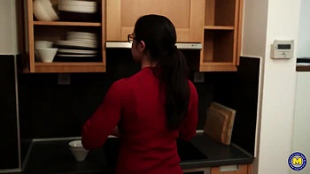 The playful young woman, drenched in moisture, delights in accommodating immense penises within her rear passage!