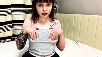 Redhead teenager with ample boobies uses a pinkish