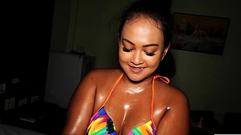 Thai MILF feeding her hungry asian pussy